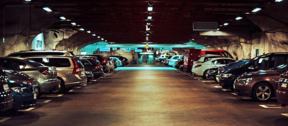 Parking garage full of cars.